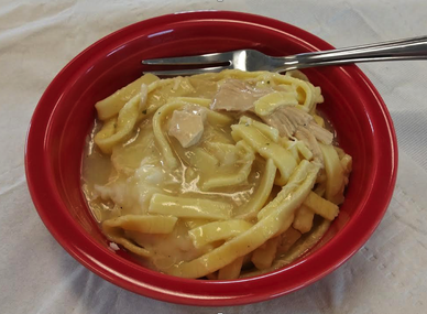 Chicken and Noodles over Mashed Potatoes